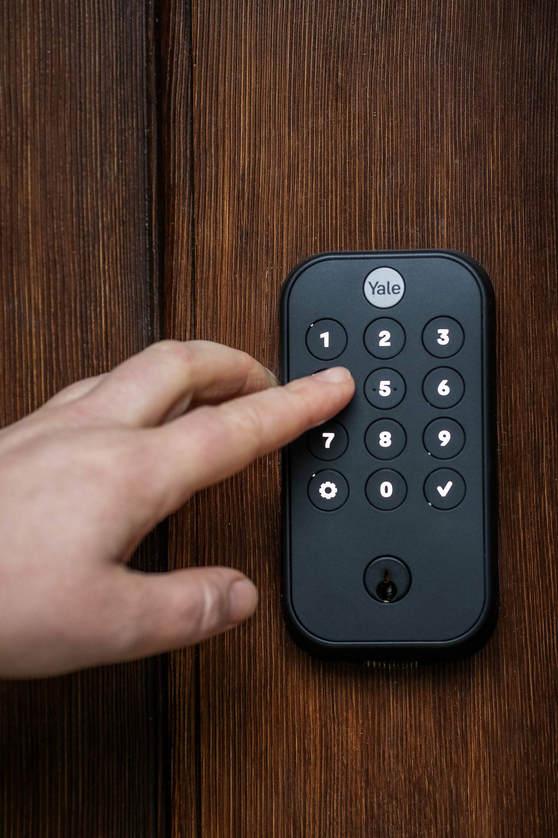 Close-up view of door keypad. 